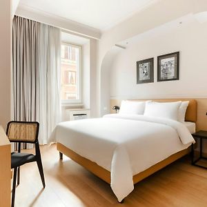 Kamer met een Queen Size Bed